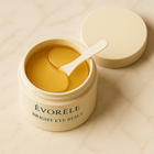 Open jar showing 30 pairs of golden hydrogel eye patches with spatula
