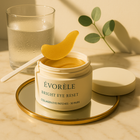 Open Bright Eye Reset jar with patch on spatula, morning vanity scene