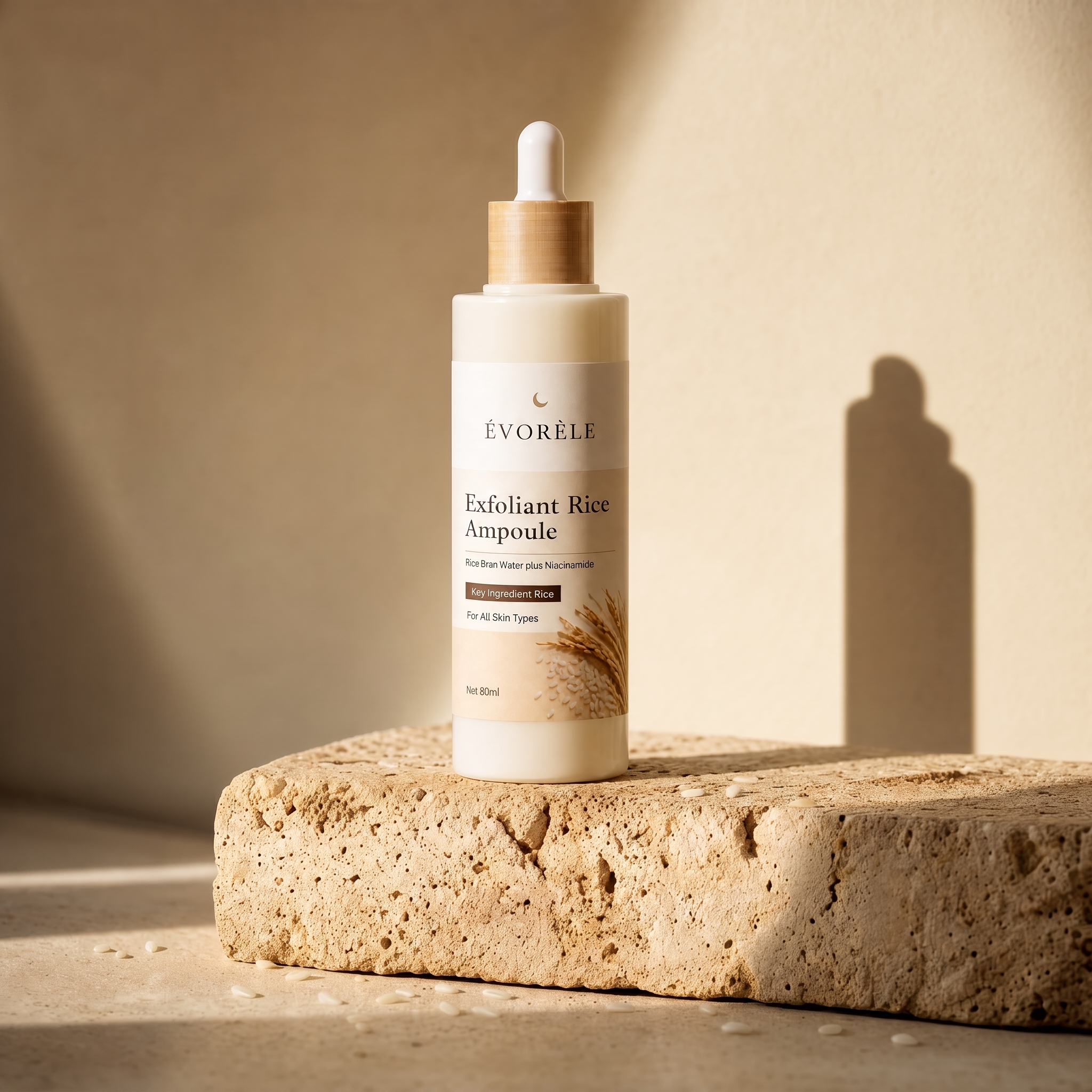 Évorèle Exfoliant Rice Ampoule bottle on travertine